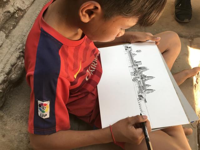 Vietnam - Kambodža - dieťa kreslí obraz