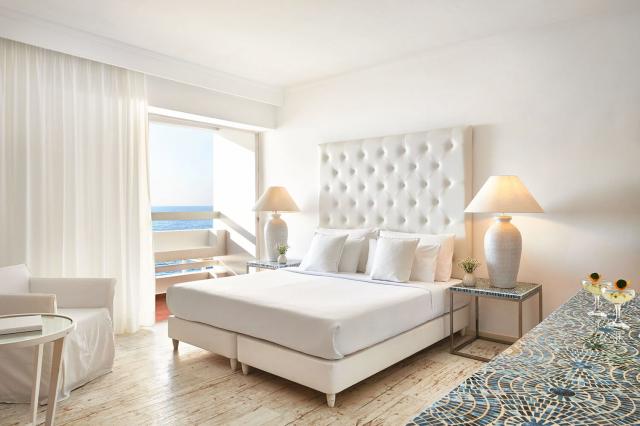 Izba v Grecotel Lux Me White Palace