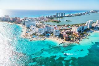 New York, Washington a relax v Cancúne