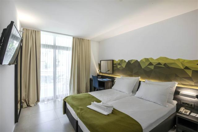 TW02 - Parent Twin Room with Balcony (1).jpg