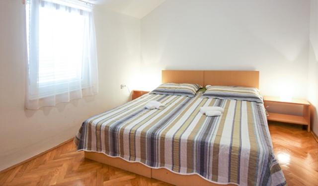 Chorvátsko - Vodice - Srima - apartmány Poseidon - spálňa