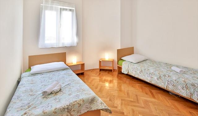 Chorvátsko - Vodice - Srima - apartmány Poseidon - spálňa