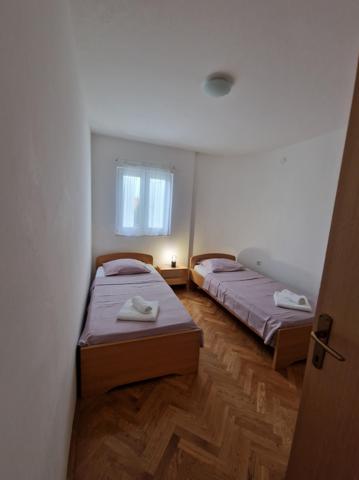 Chorvátsko - Vodice - Srima - apartmány Poseidon - spálňa