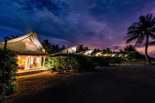 Beach Bungalows at night.jpg
