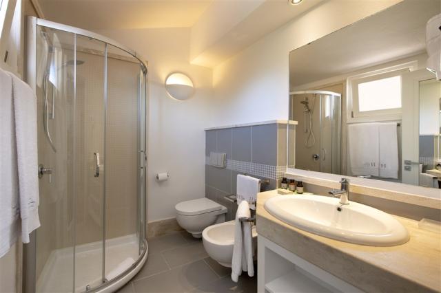 Chia Laguna_Hotel Village_Pool Family Room6_Second Bathroom.jpg