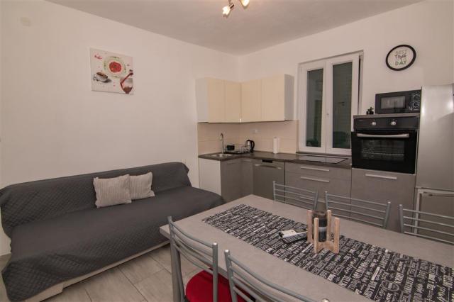 Interíér apartmánu č.1- obývačka s kuchyňou