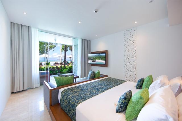 Ložnice s výhledem na oceán pokoje Junior Suite Ocean View