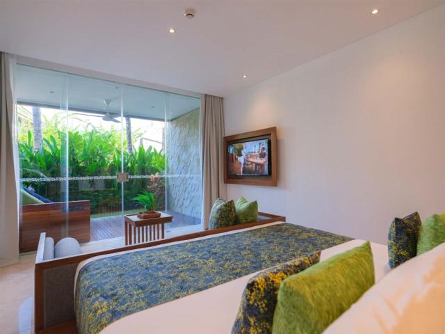 Ložnice s výhledem do zahrady pokoje Junior Suite Garden View