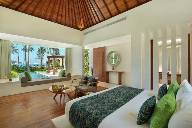 Ložnice s výhledem na bazén pokoje Luxury Pool Villa